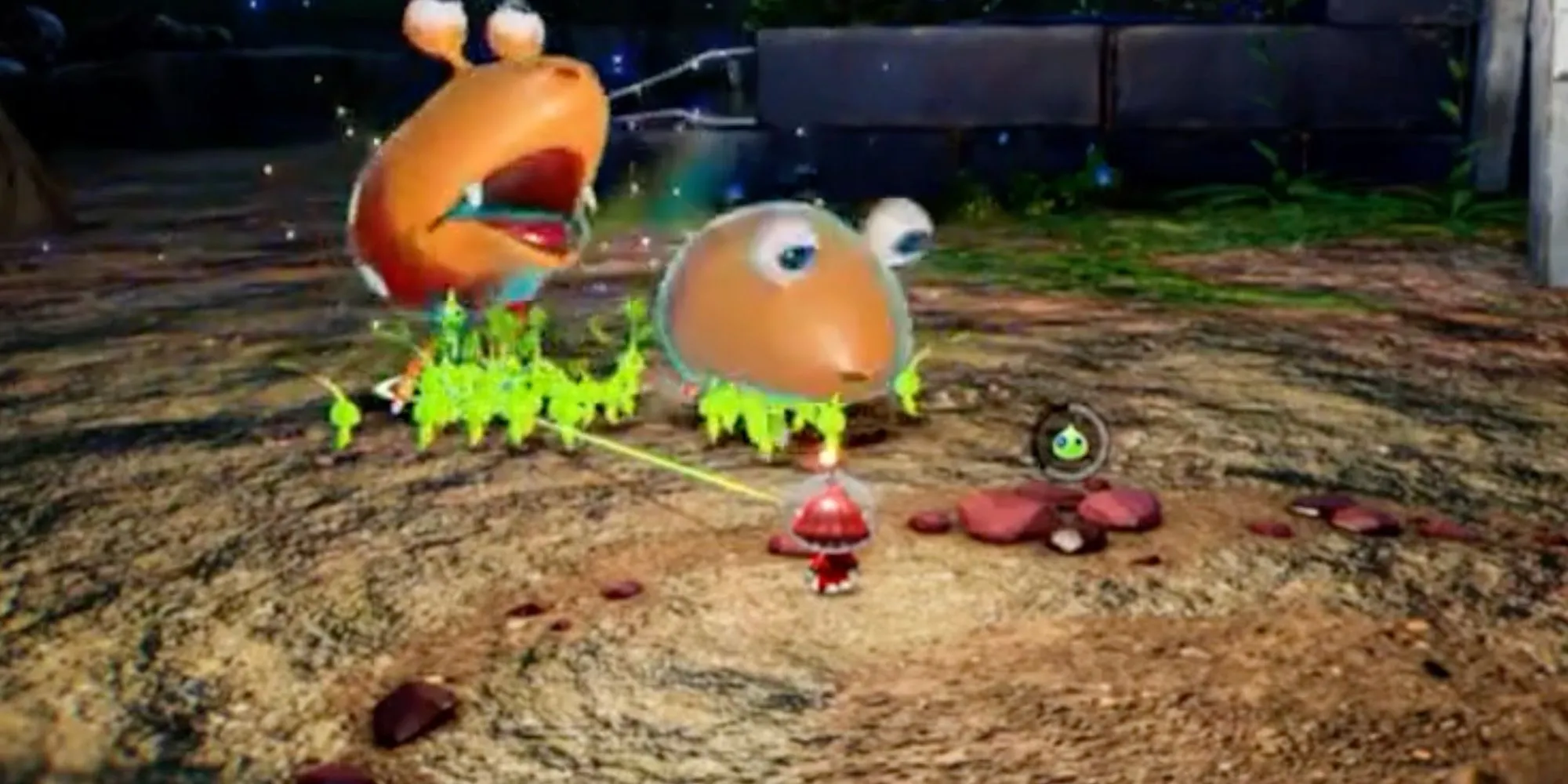 Các Pikmin phát sáng (Glow Pikmin) đang làm choáng kẻ địch trong môi trường hang động tối