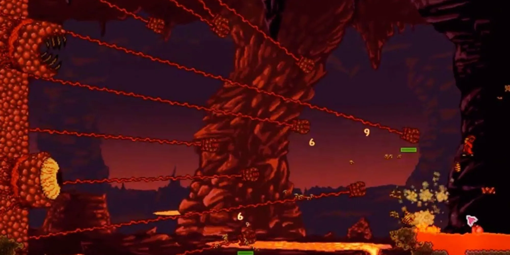 Hình ảnh người chơi đối đầu với Wall of Flesh trong Terraria ở khu vực Địa ngục