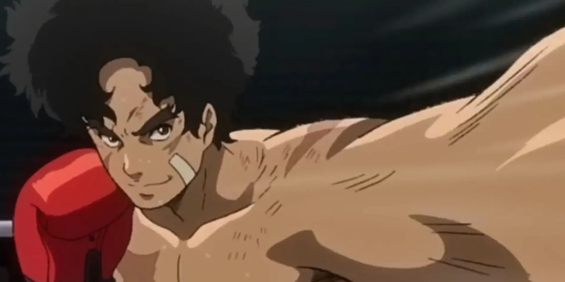 Joe tung cú đấm mạnh mẽ trong một trận đấu Megalobox kịch tính