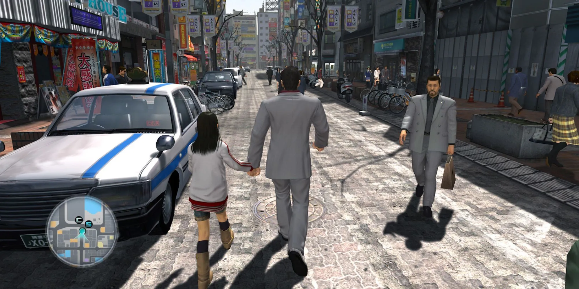Kiryu và Haruka đi dạo trong Yakuza 3 Remastered