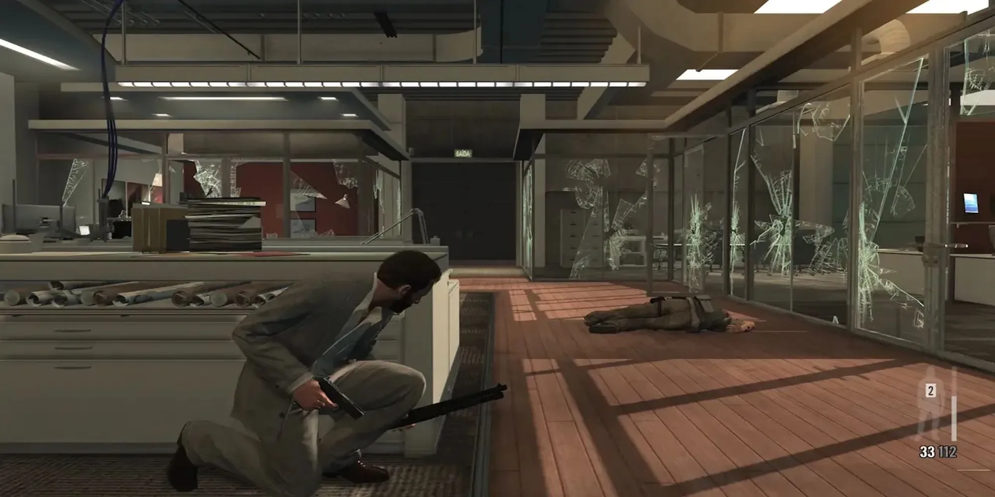 Max Payne đang nhảy và bắn súng trong chế độ làm chậm thời gian 'Bullet Time' trong game Max Payne 3.
