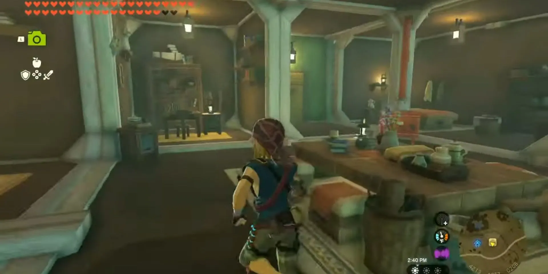 Nhân vật Link trong Zelda Tears of the Kingdom đang sử dụng năng lực Ultrahand để di chuyển một khối nhà