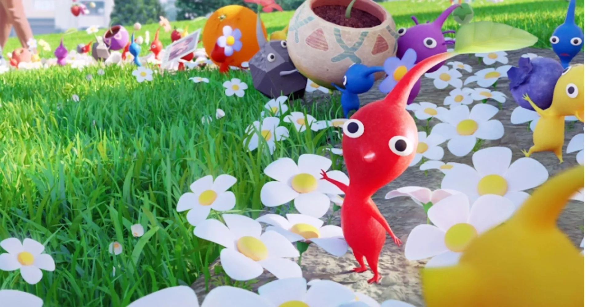 Pikmin Bloom, Pikmin đỏ vẫy tay chào máy ảnh trong khi các Pikmin khác đang mang nhiều đồ vật khác nhau