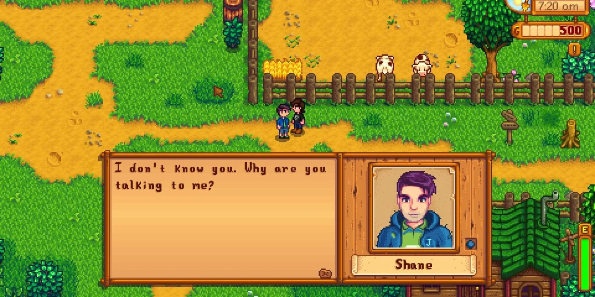 Shane trong game Stardew Valley với vẻ mặt buồn bã, đứng gần hàng rào trong trang phục quen thuộc.