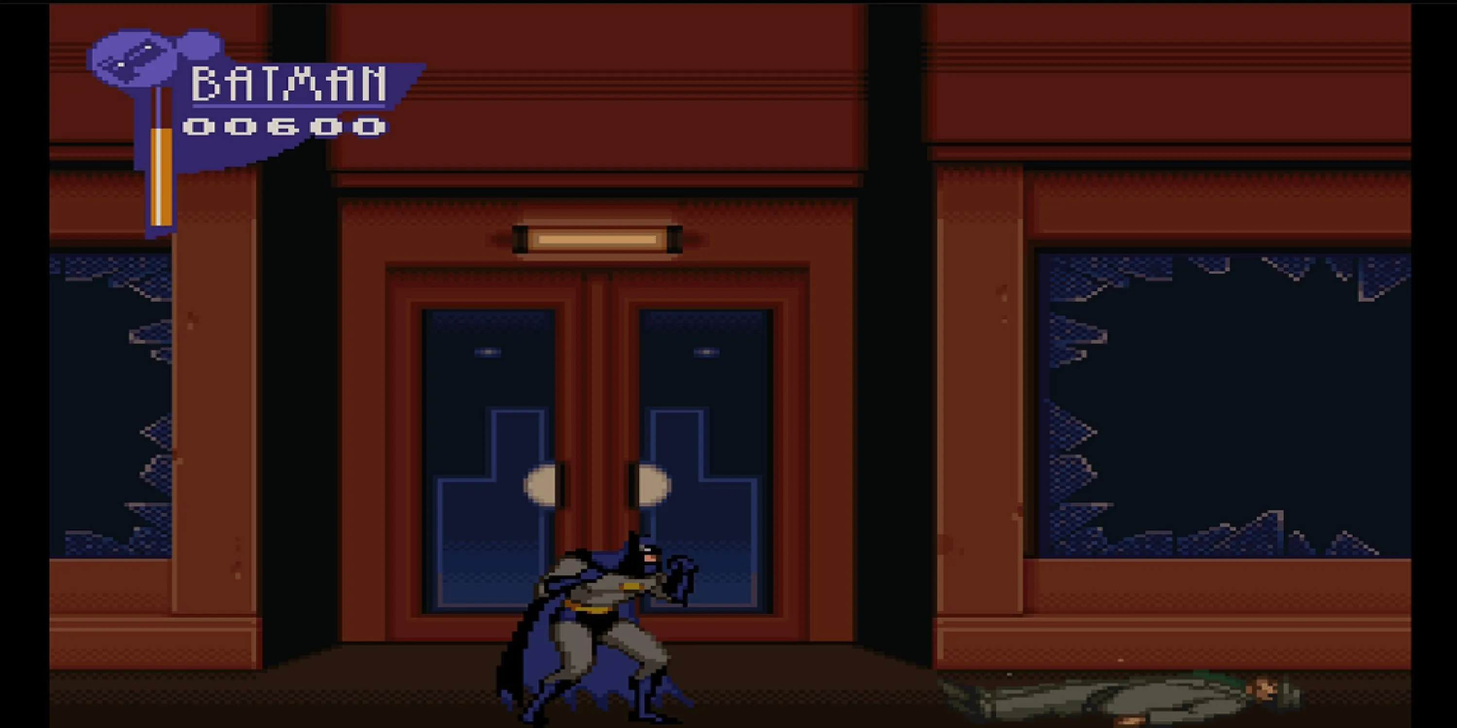 Batman sau khi đánh bại kẻ thù trên đường phố trong The Adventures of Batman and Robin