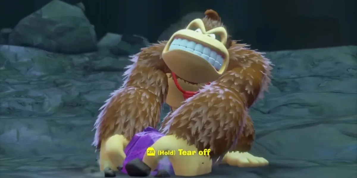 Donkey Kong đang sử dụng kỹ năng Tear Off Chunks, nhấc một mảnh đất lớn