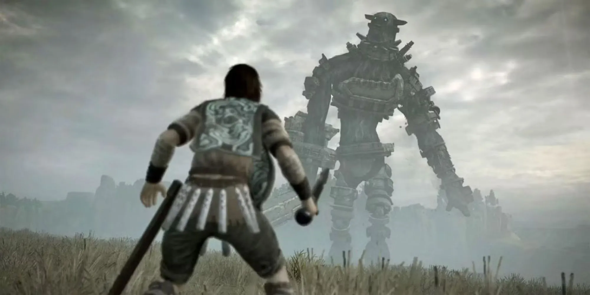 Wander đứng trước một Colossus khổng lồ, biểu tượng của sự bi tráng trong Shadow of the Colossus.