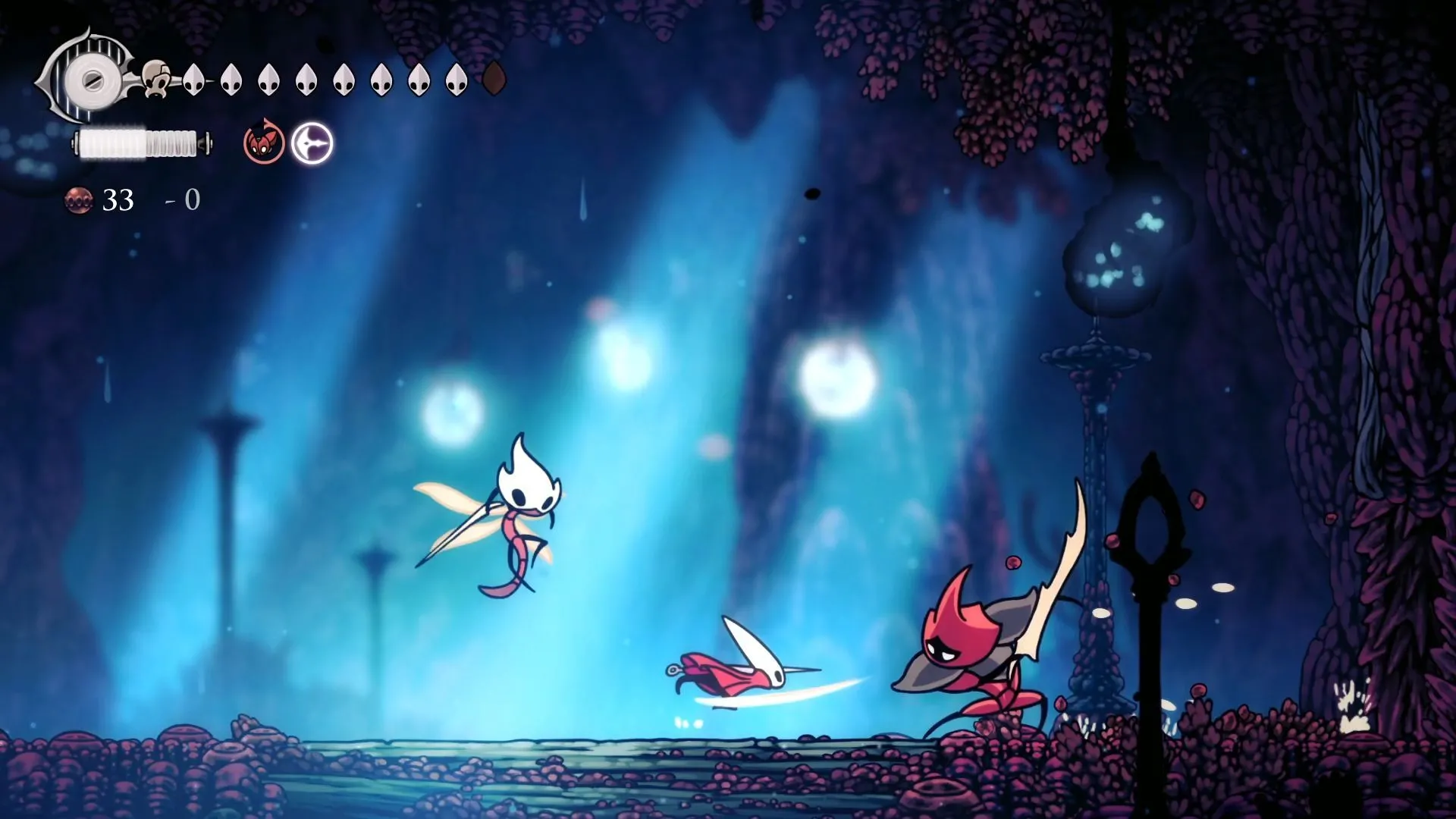 Hornet tấn công một kẻ địch san hô trong Hollow Knight Silksong